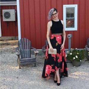 High low, two piece style gown. Floral print ball gown skirt and black tank top.